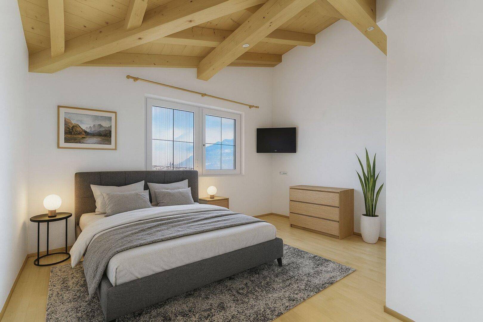 Helles Schlafzimmer mit Holzbalkendecke, Parkettboden und Blick auf die umliegende Berglandschaft.
