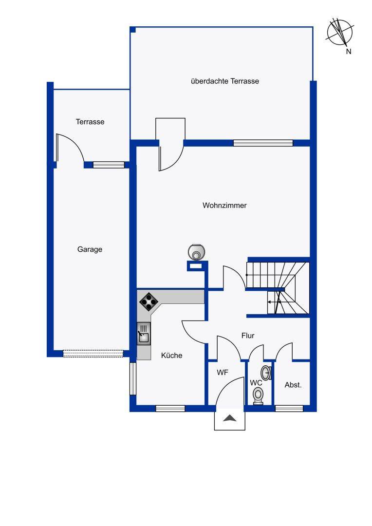 Grundriss des Erdgeschosses mit Küche, Wohnzimmer, WC und Zugang zur Garage und Terrasse.