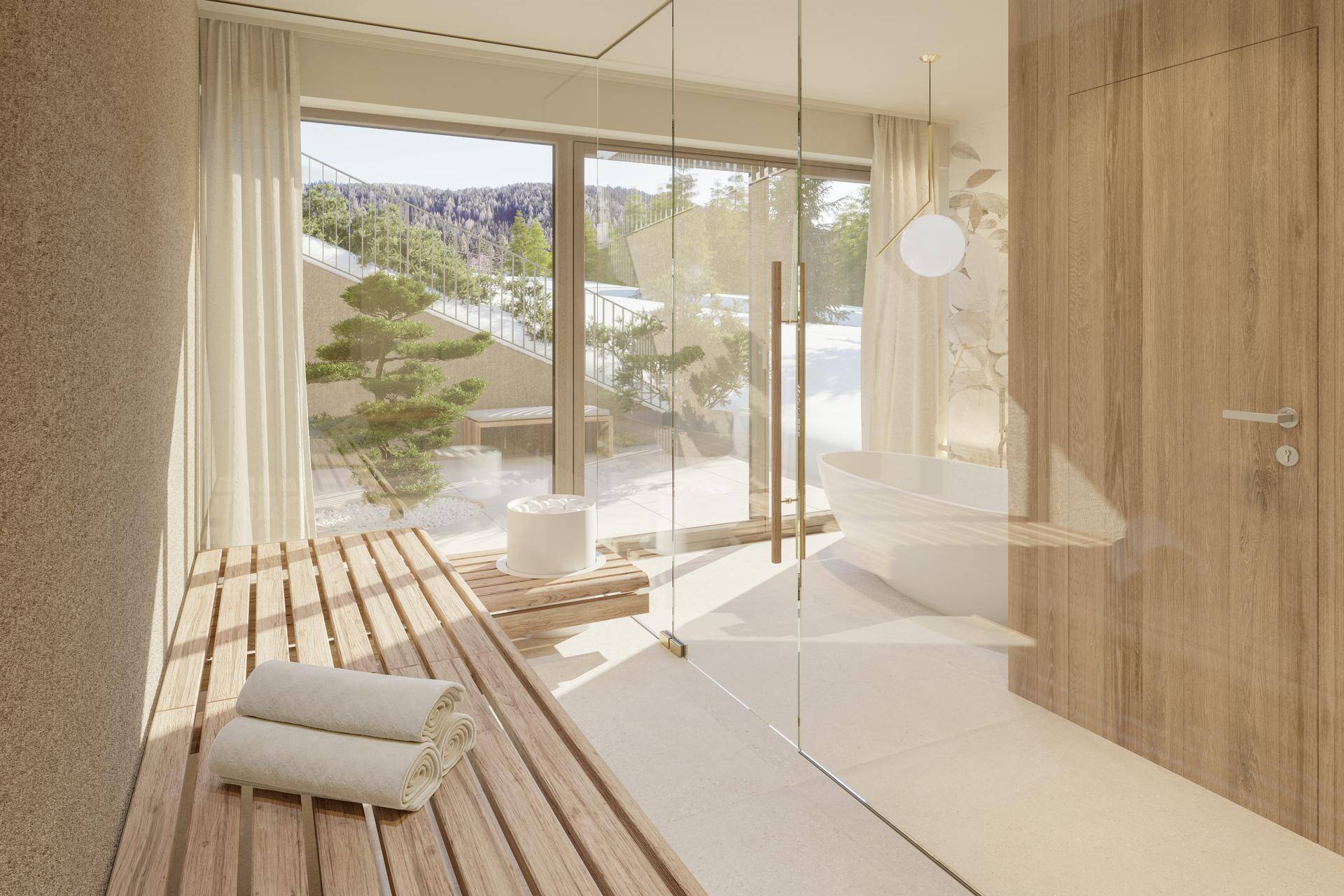 Luxuriöser Wellnessbereich mit Sauna, freistehender Badewanne und großen Fenstern mit Bergblick.