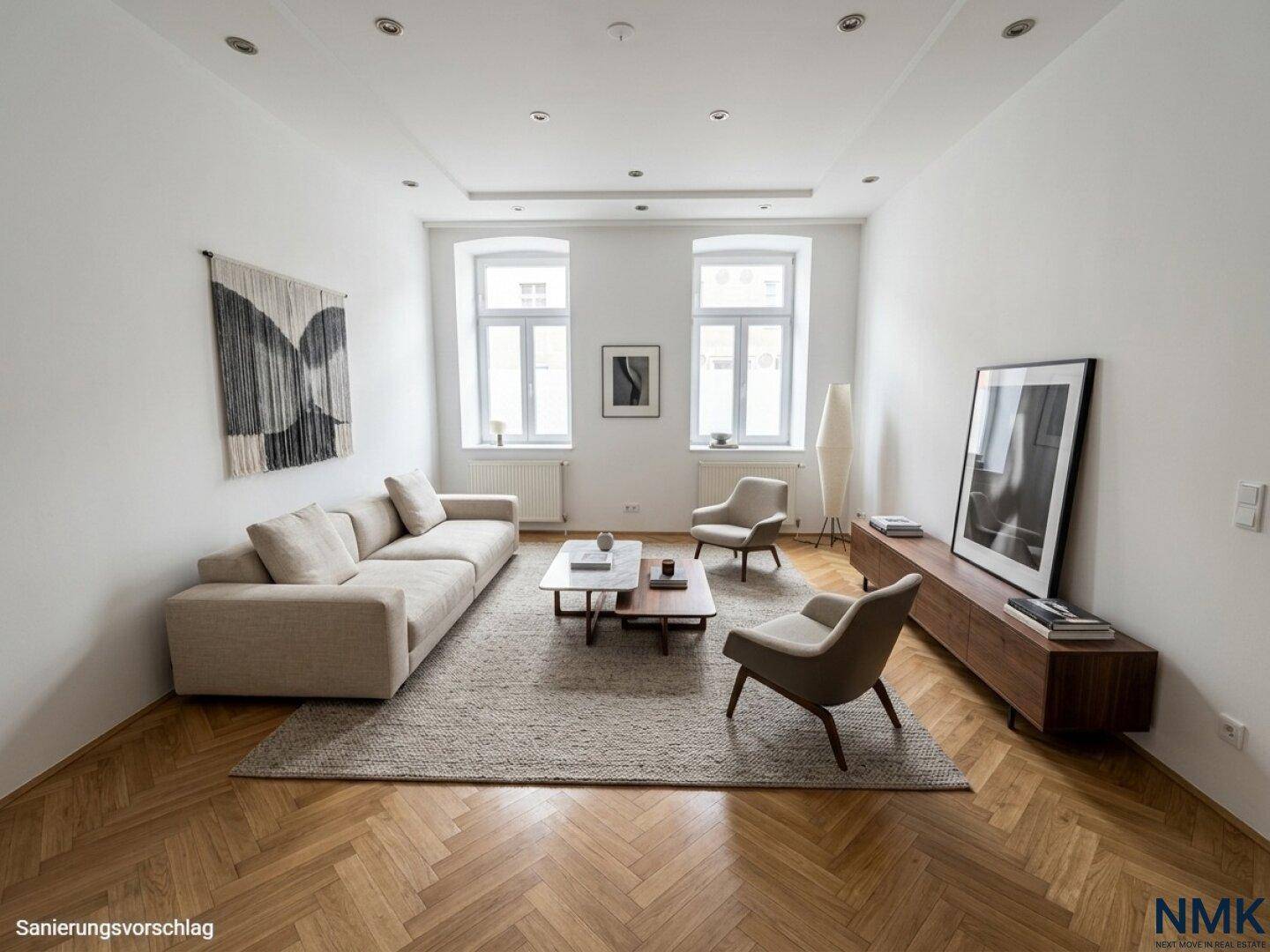 Helles, modern eingerichtetes Wohnzimmer mit Fischgrätparkett, beigem Sofa und stilvollen Möbeln.