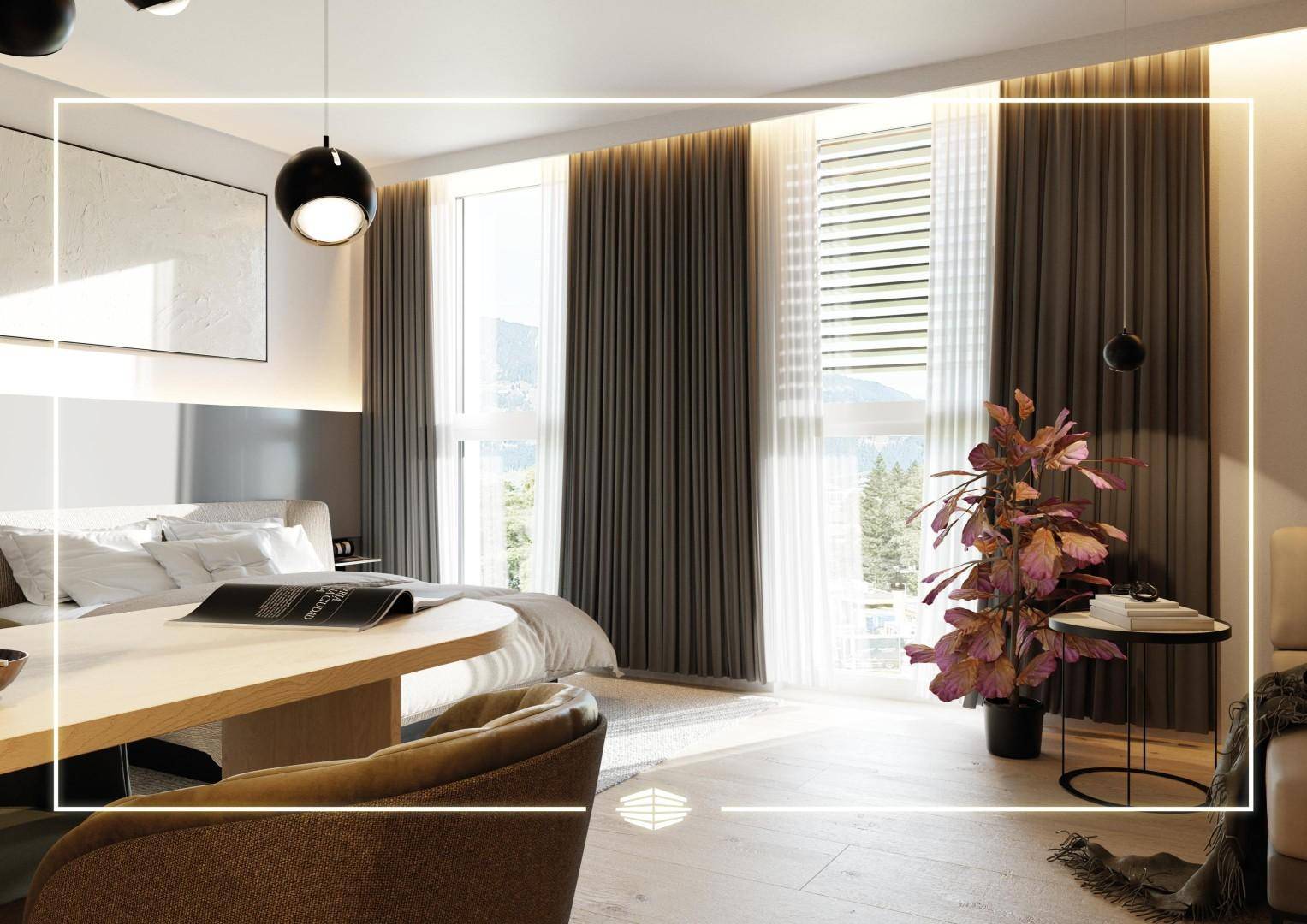Helles Schlafzimmer mit großen Fenstern, die einen weiten Blick auf die grüne Landschaft bieten.