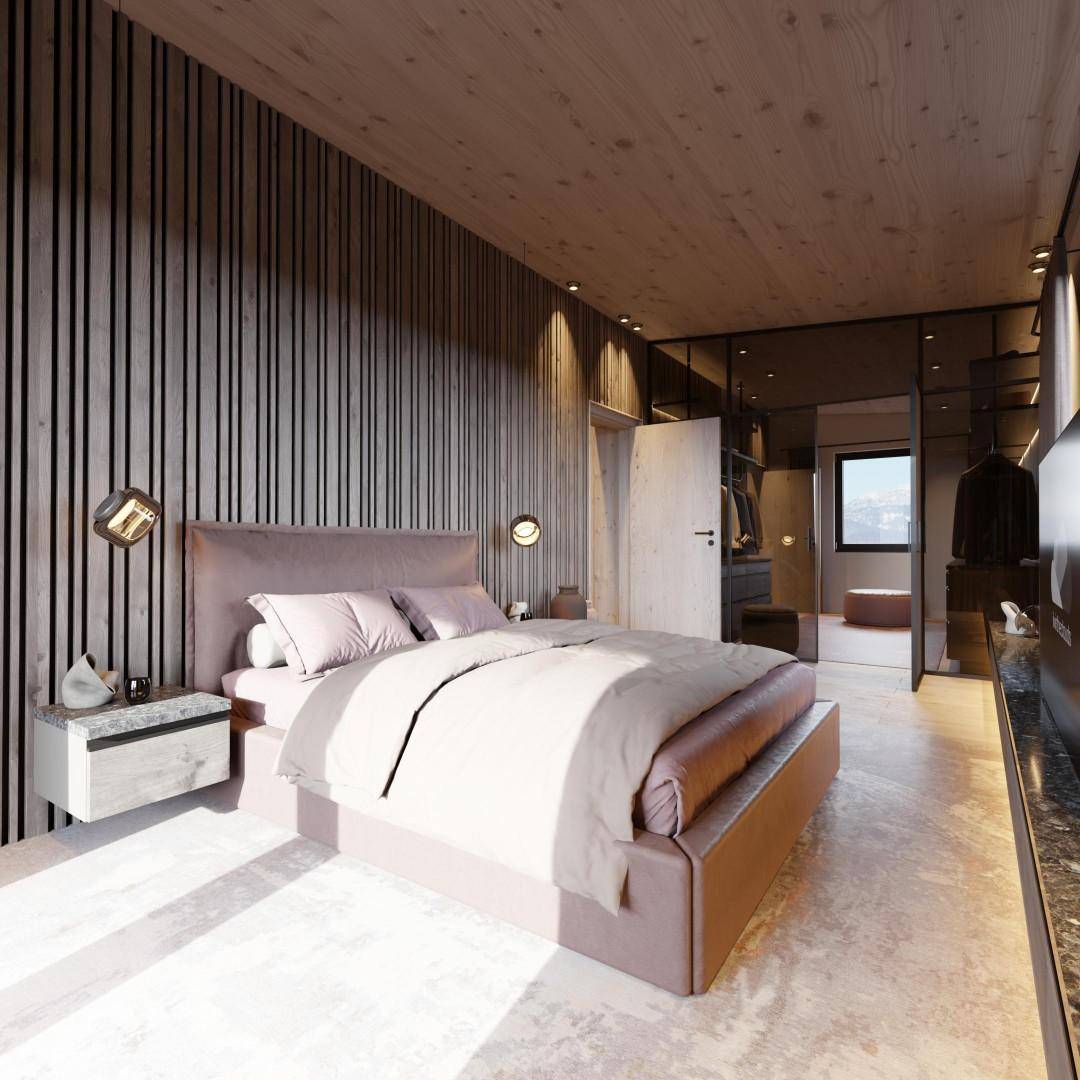 Modernes Schlafzimmer mit Holzwänden, Decke und einem großen Bett, das zu einem Ankleidezimmer führt.