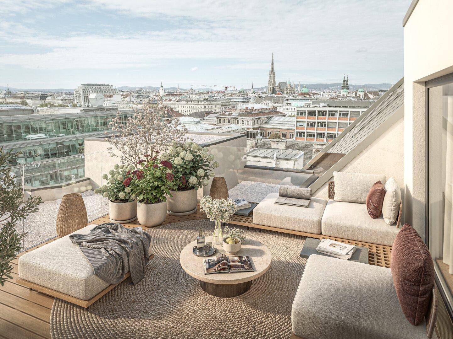 Großzügige Dachterrasse mit Lounge-Möbeln und weitem Blick über die Stadt Wien.