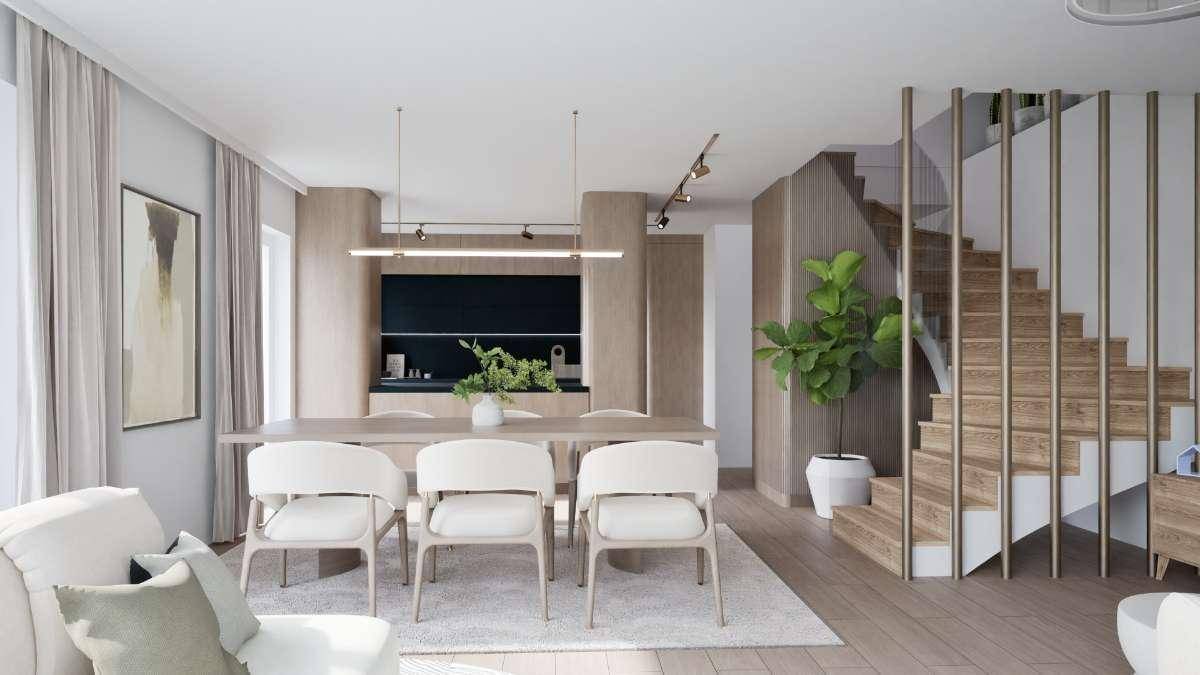 Offener Wohn-Essbereich mit integrierter schwarzer Küche, Holztreppe und modernem Design.