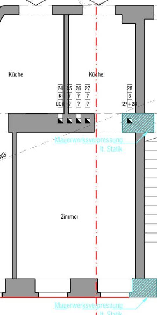 Grundrissplan zeigt die Raumaufteilung mit Küchen- und Zimmerbereichen.