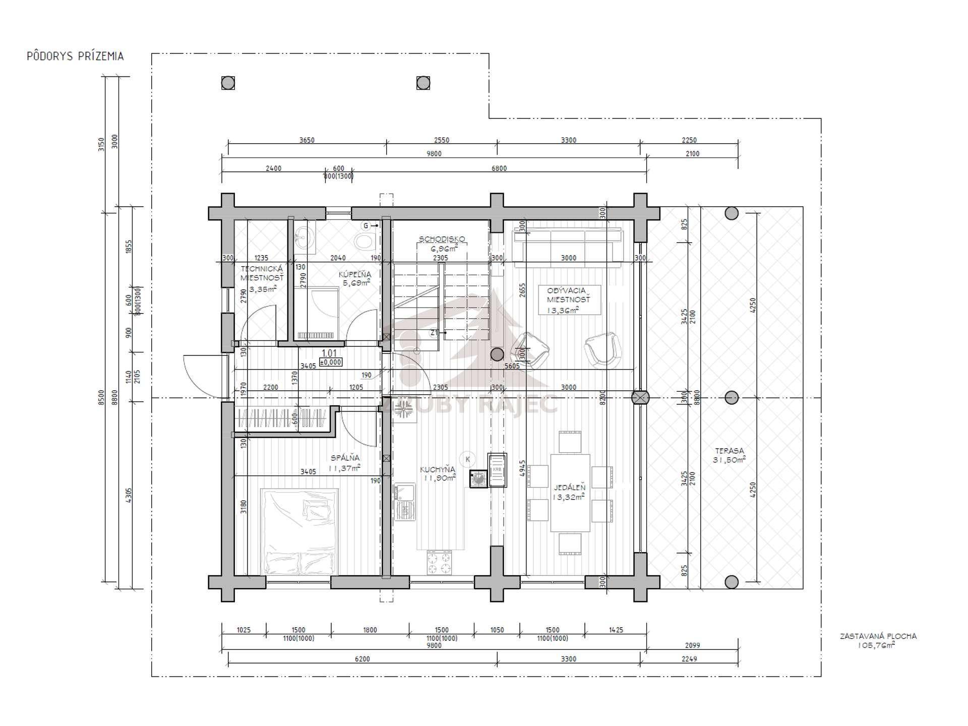Grundriss des Erdgeschosses mit offenem Wohnbereich, Küche, Schlafzimmer und einer Terrasse.