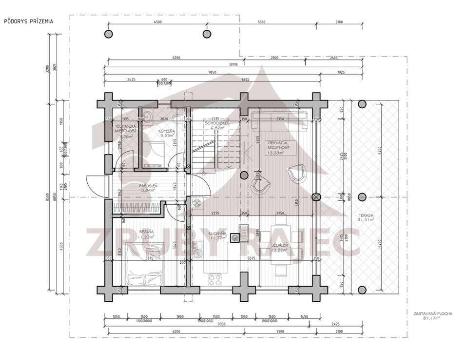 Grundriss des Erdgeschosses eines Blockhauses mit offener Küche, Essbereich und Terrasse.