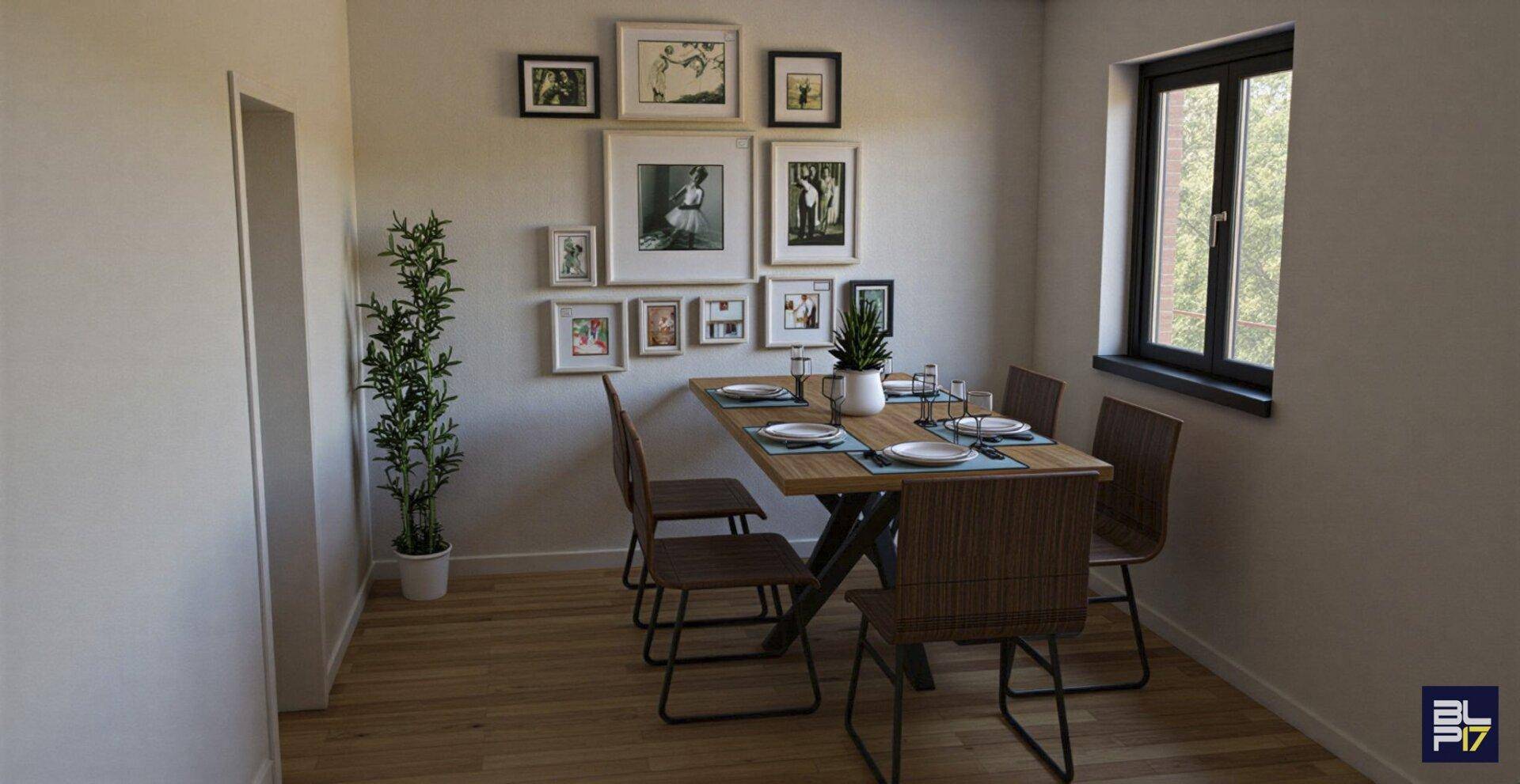 Gemütlicher Essbereich mit Holztisch, Stühlen und dekorativen Bildern an der Wand.