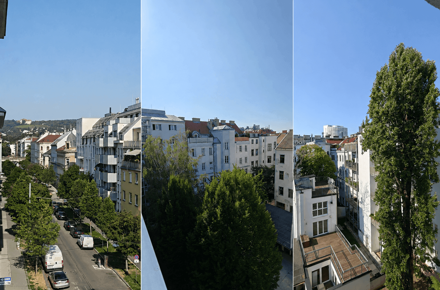 Weitläufiger Blick über die städtische Umgebung mit Gebäuden, Bäumen und Straßen.