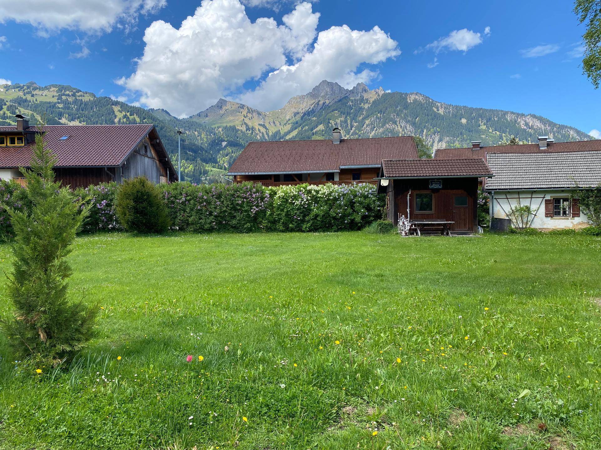 Sonniges Baugrundstück mit Hahnenkamm- &amp; Burgenblick in Ehenbichl - Ansicht 2