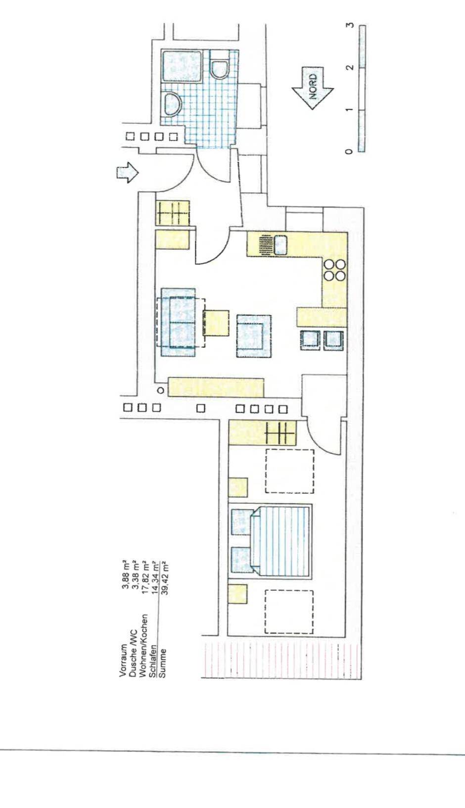 Grundriss einer Dachgeschosswohnung mit offenem Wohnbereich, Schlafzimmer und Bad.