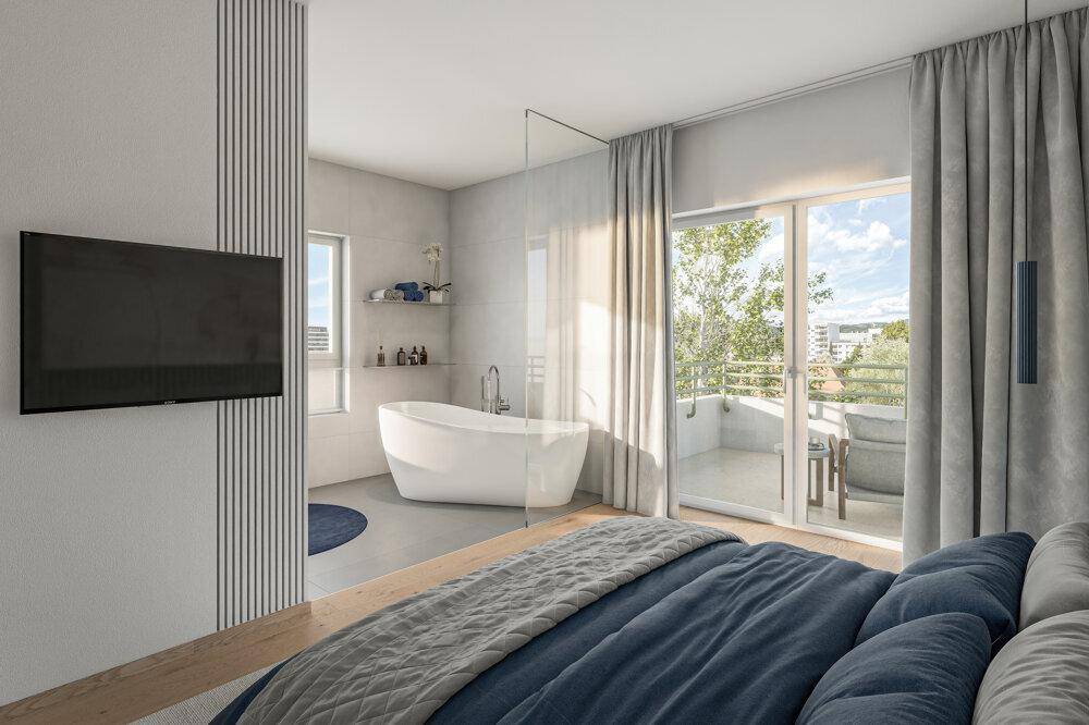 Modernes Schlafzimmer mit freistehender Badewanne, Balkonzugang und viel Tageslicht.