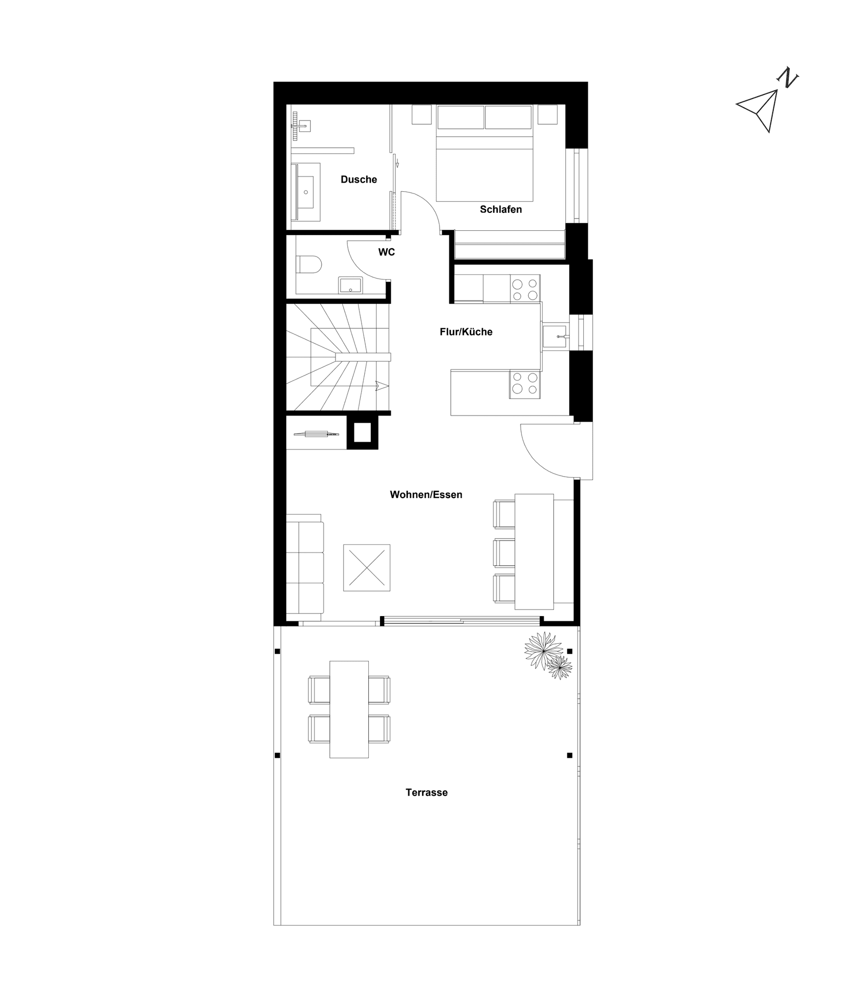 Grundriss des Erdgeschosses mit Wohn-Essbereich, Küche, WC und Terrasse.