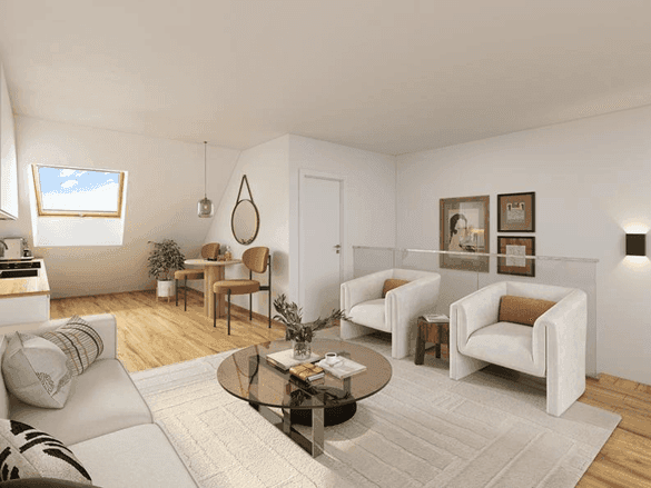 Gemütlicher Wohnbereich in einer Dachgeschosswohnung mit Dachfenster, Sofa und Esstisch.