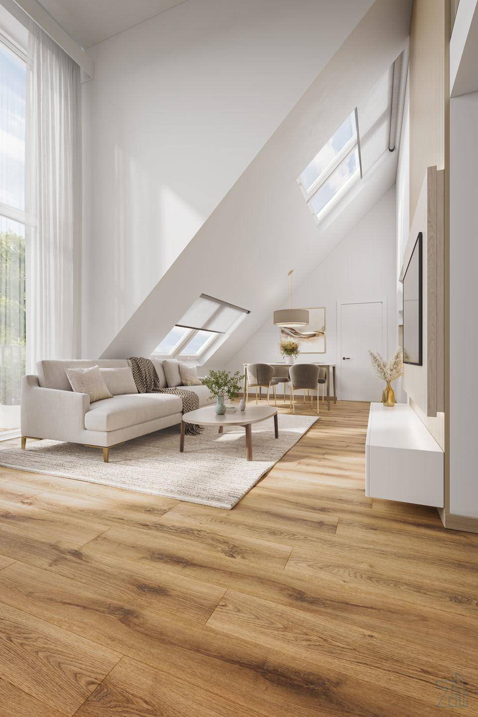 Geräumiges Wohn- und Esszimmer im Dachgeschoss mit hohen Decken und Holzboden.