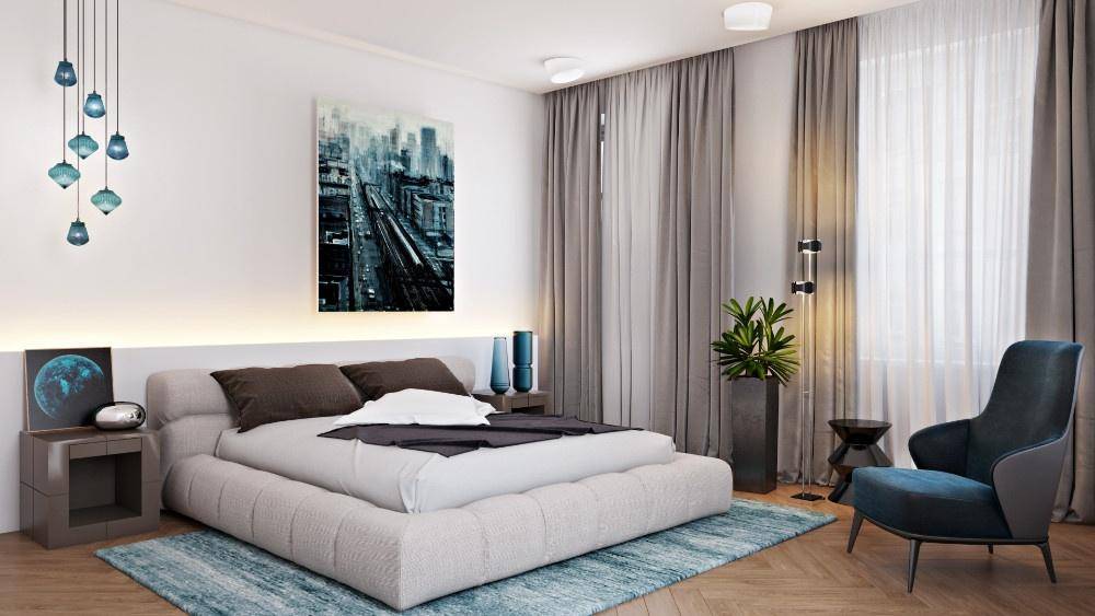 Modernes Schlafzimmer mit großem Bett, Holzboden und blauen Akzenten in der Dekoration.