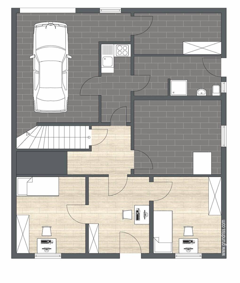 Grundriss des Untergeschosses mit Garage, zwei Schlafzimmern und zusätzlichem Bad.