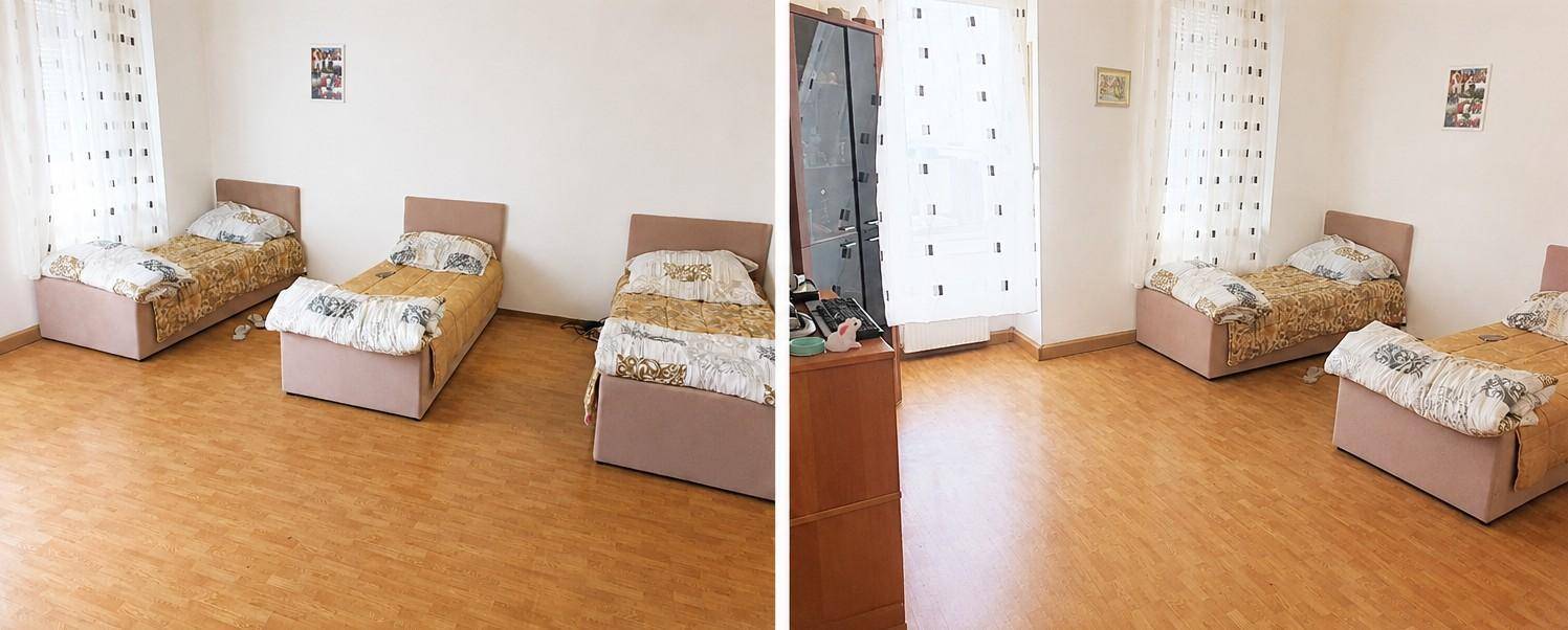 Helles Schlafzimmer mit drei Einzelbetten und Holzfußboden, ideal für Gäste oder Kinder.