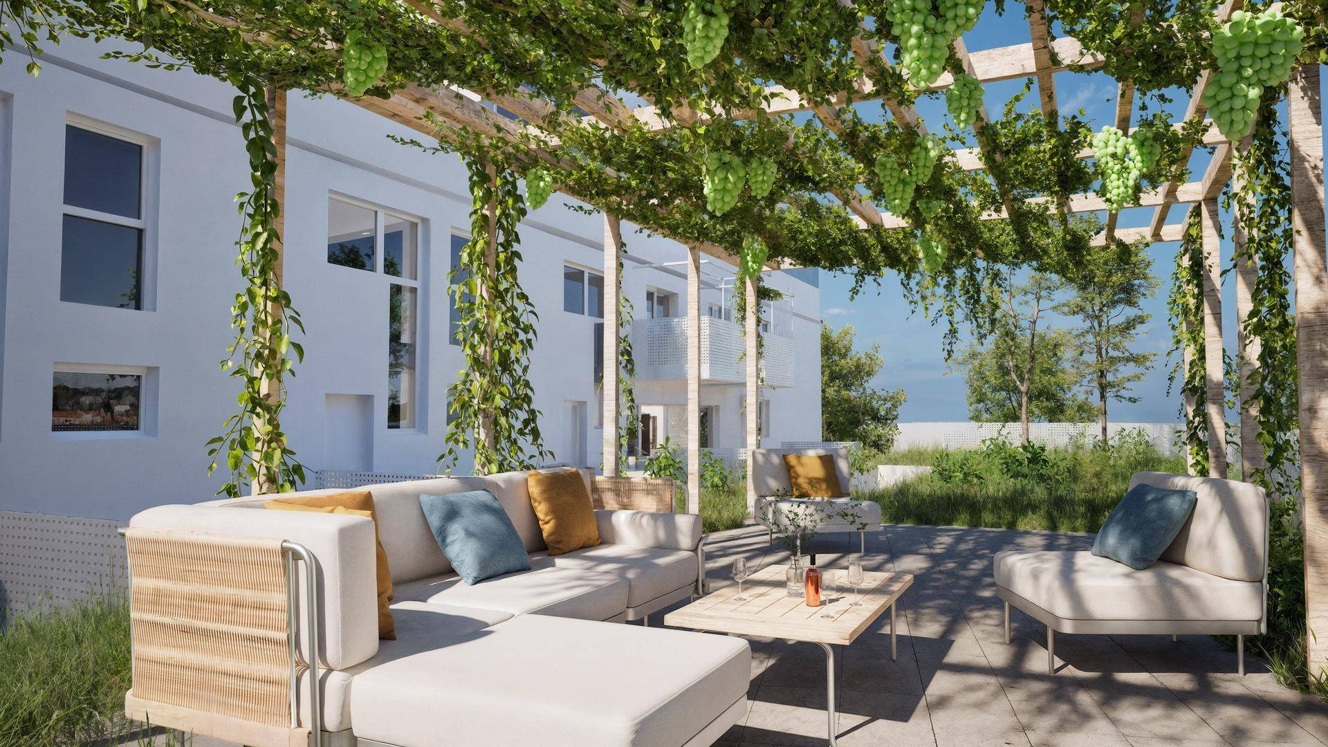 Eine gemütliche Terrasse mit modernen Gartenmöbeln unter einer begrünten Pergola.