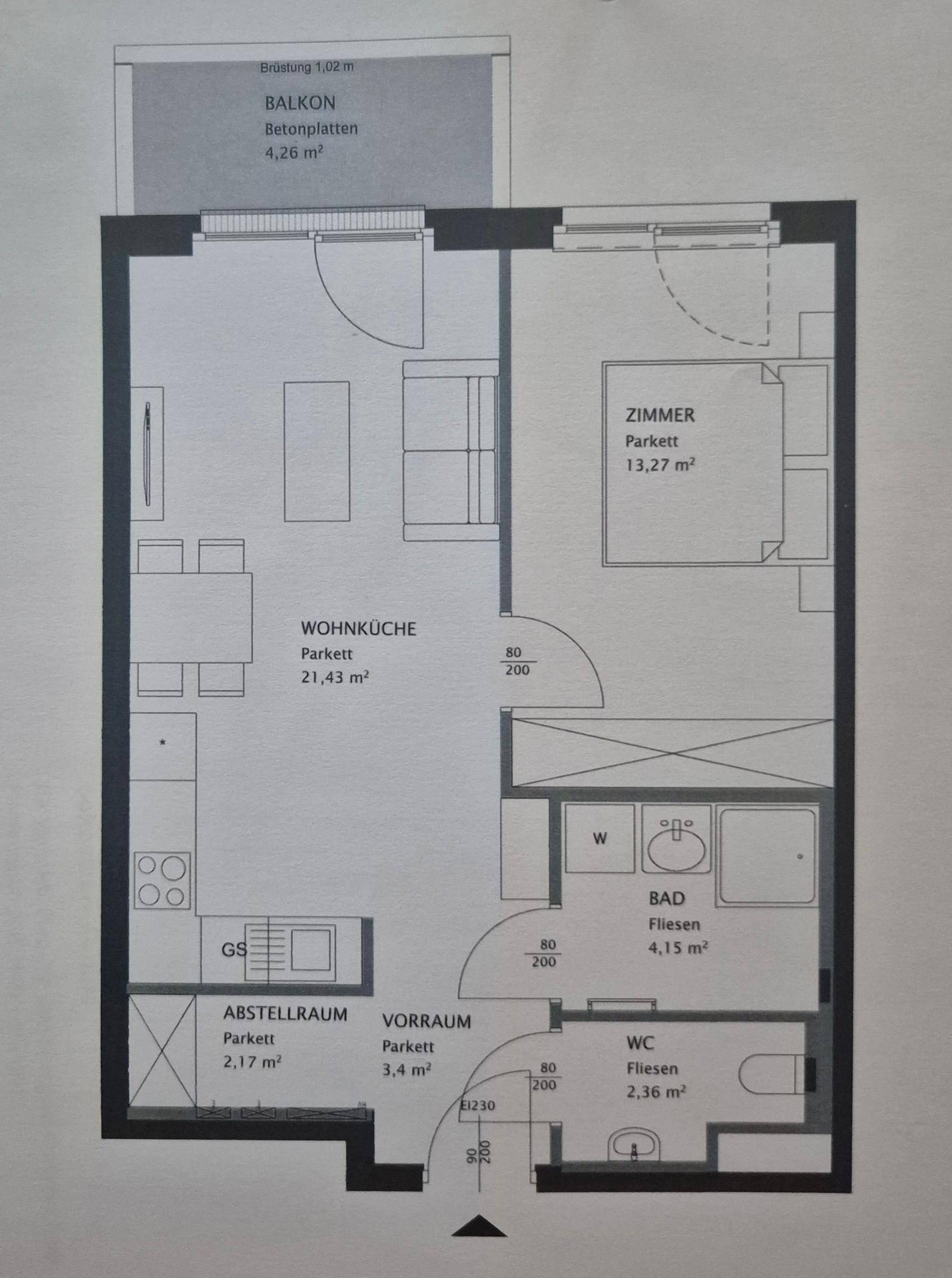 Grundriss einer Wohnung mit Wohnküche, Schlafzimmer, Bad, WC und Balkon.