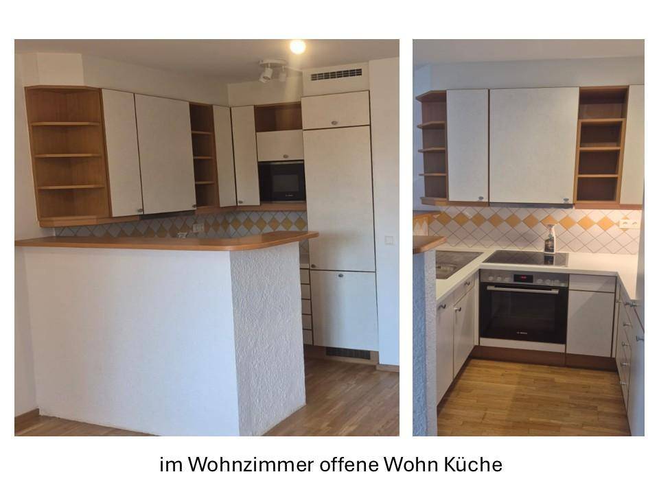 Offene Wohnküche mit weißen Schränken, Holztheke und integrierten Geräten im Wohnbereich.