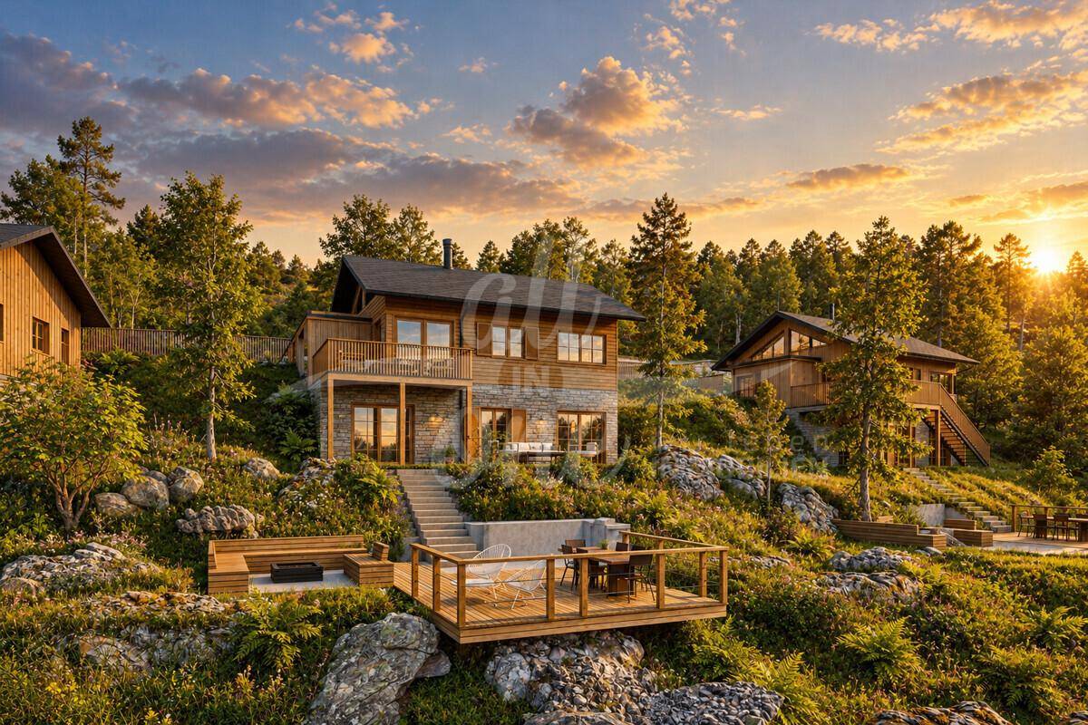 Chalet in grüner Berglandschaft bei Sonnenuntergang mit Terrasse und Blick auf die bewaldeten Hügel.