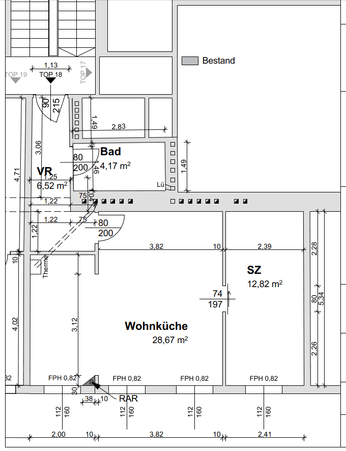 Grundriss einer Wohnung mit offener Wohnküche, Schlafzimmer und Bad.