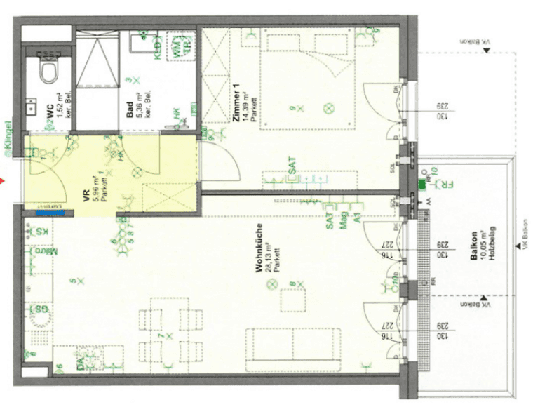 Grundriss einer Wohnung mit Wohnküche, Schlafzimmer, Bad und Balkon.