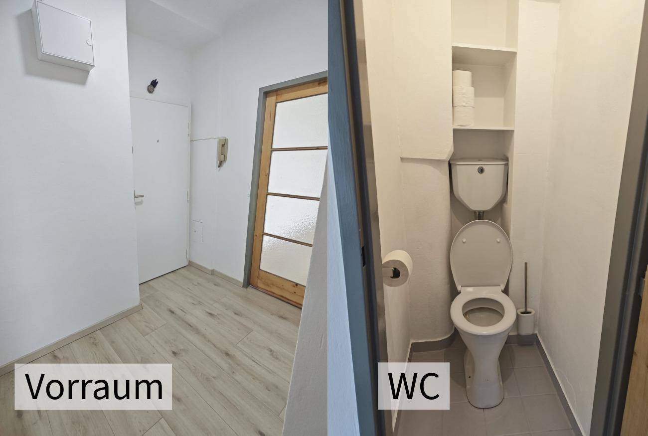 Heller Vorraum mit Laminatboden und separates WC mit Fliesenboden.