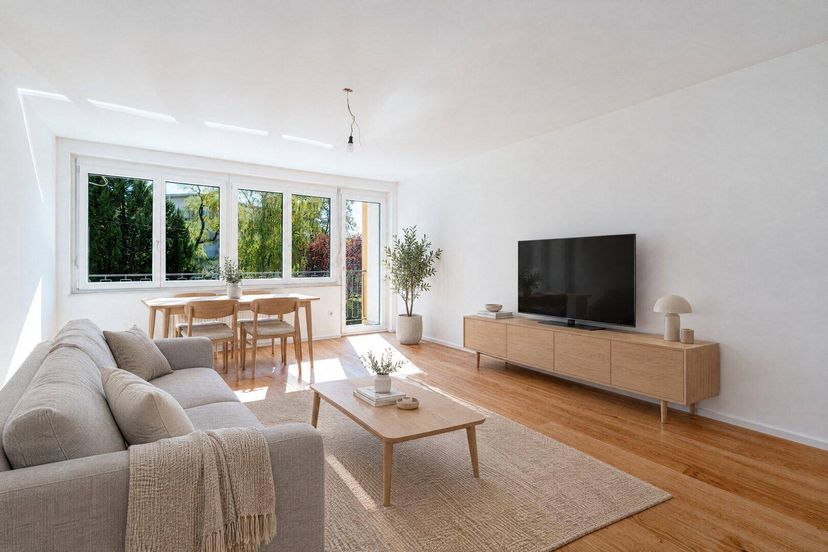 Virtuell inszenierter Wohn-Essbereich mit Sofa, Esstisch und großen Fenstern, die viel Licht hereinlassen.