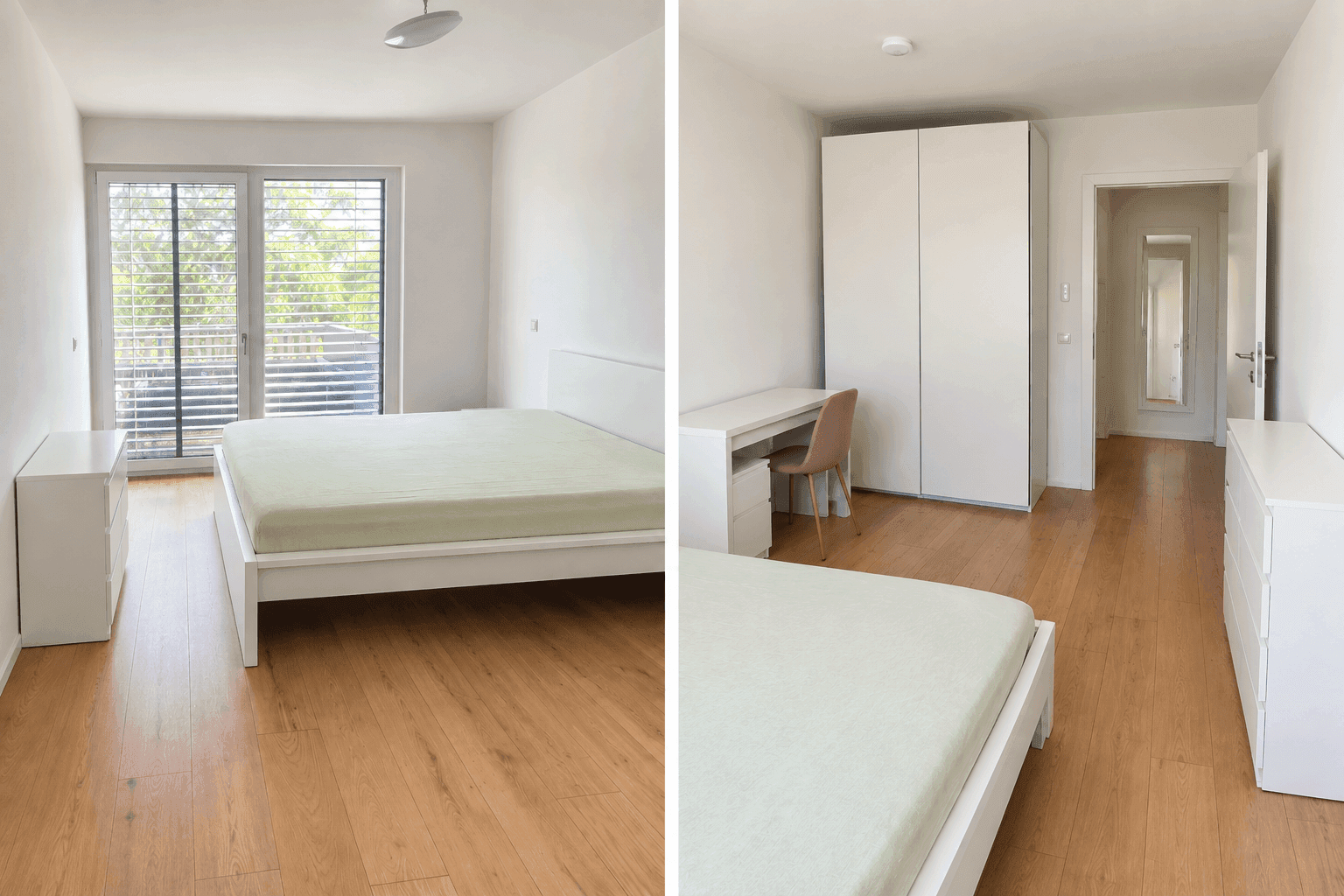 Helles Schlafzimmer mit Holzboden, großem Fenster und weißem Kleiderschrank.