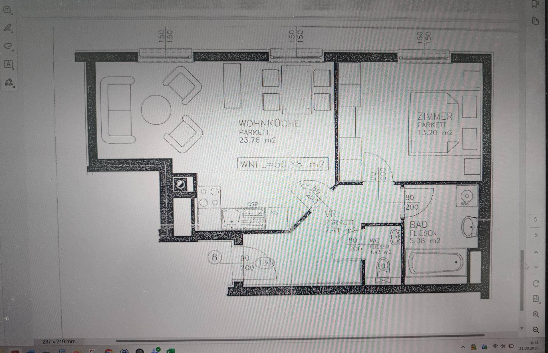 Grundriss einer Wohnung mit Wohnküche, Schlafzimmer und Badezimmer, inklusive Flächenangaben.