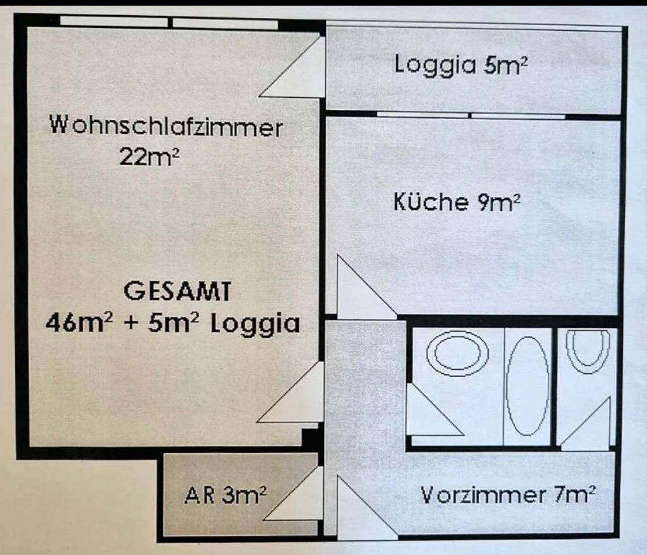 Grundrissplan einer Wohnung mit Wohnschlafzimmer, Küche, Loggia und Abstellraum.