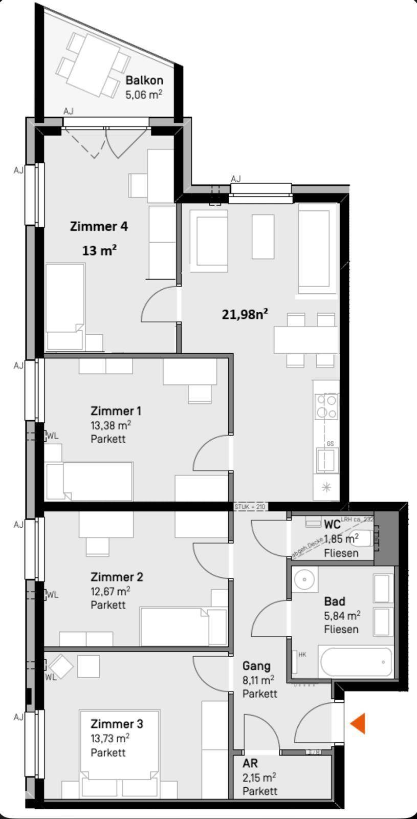 Grundriss einer Wohnung mit vier Zimmern, Balkon, Bad und separatem WC.