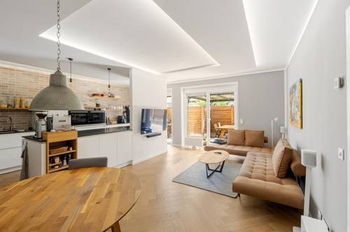 Hochwertig ausgestattete, neuwertige und barrierefreie 3 Zimmer Wohnung mit Echtholzparkett, Terrasse und Grillplatz im ruhigen Innenhof!