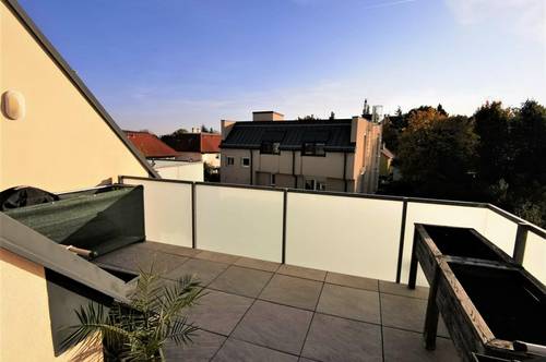 Topmoderne Dachgeschosswohnung mit Grünblick in zentraler Brunner Wohnlage- 2 Tiefgaragenstellplätze inklusive!
