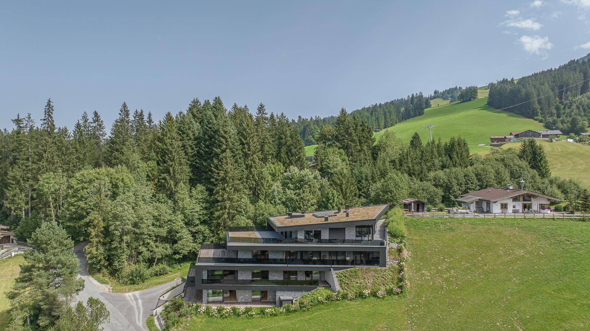 KITZIMMO-Luxuswohnung im Chaletstil kaufen Immobilien Kirchberg Tirol.