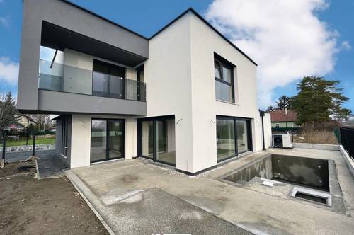 Exklusives Wohnen in Gerasdorf - DESIGNERHAUS mit Pool und Garage in höchster Qualität
